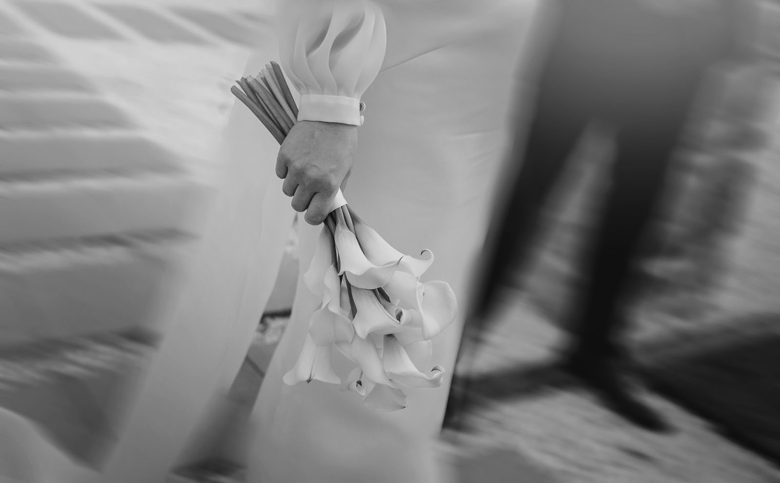 st joseph's chapel wedding – diana & michael 41 Bride in a white wedding dress holding a bouquet of calla lilies