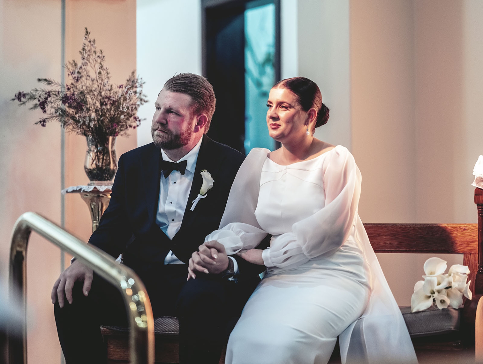 st joseph's chapel wedding – diana & michael 12 Diana and Michael seated together during their wedding ceremony at St Joseph's Chapel, Kensington