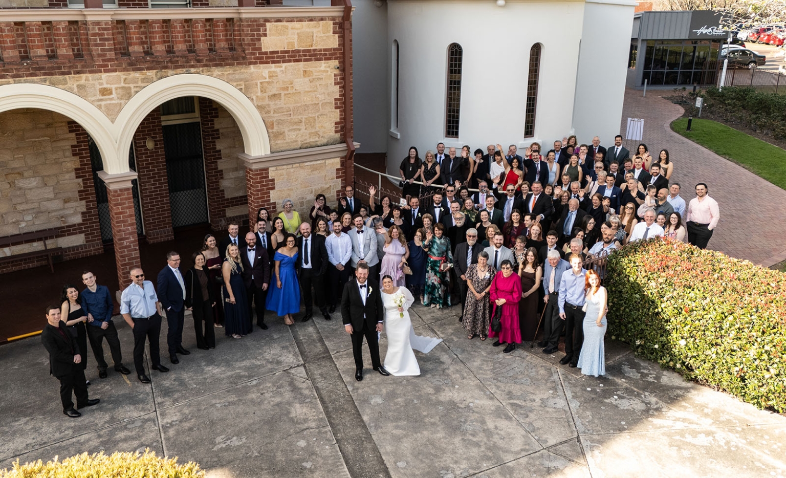 st joseph's chapel wedding – diana & michael 20 Diana and Michael standing with their wedding guests outside St Joseph's Chapel in Kensington