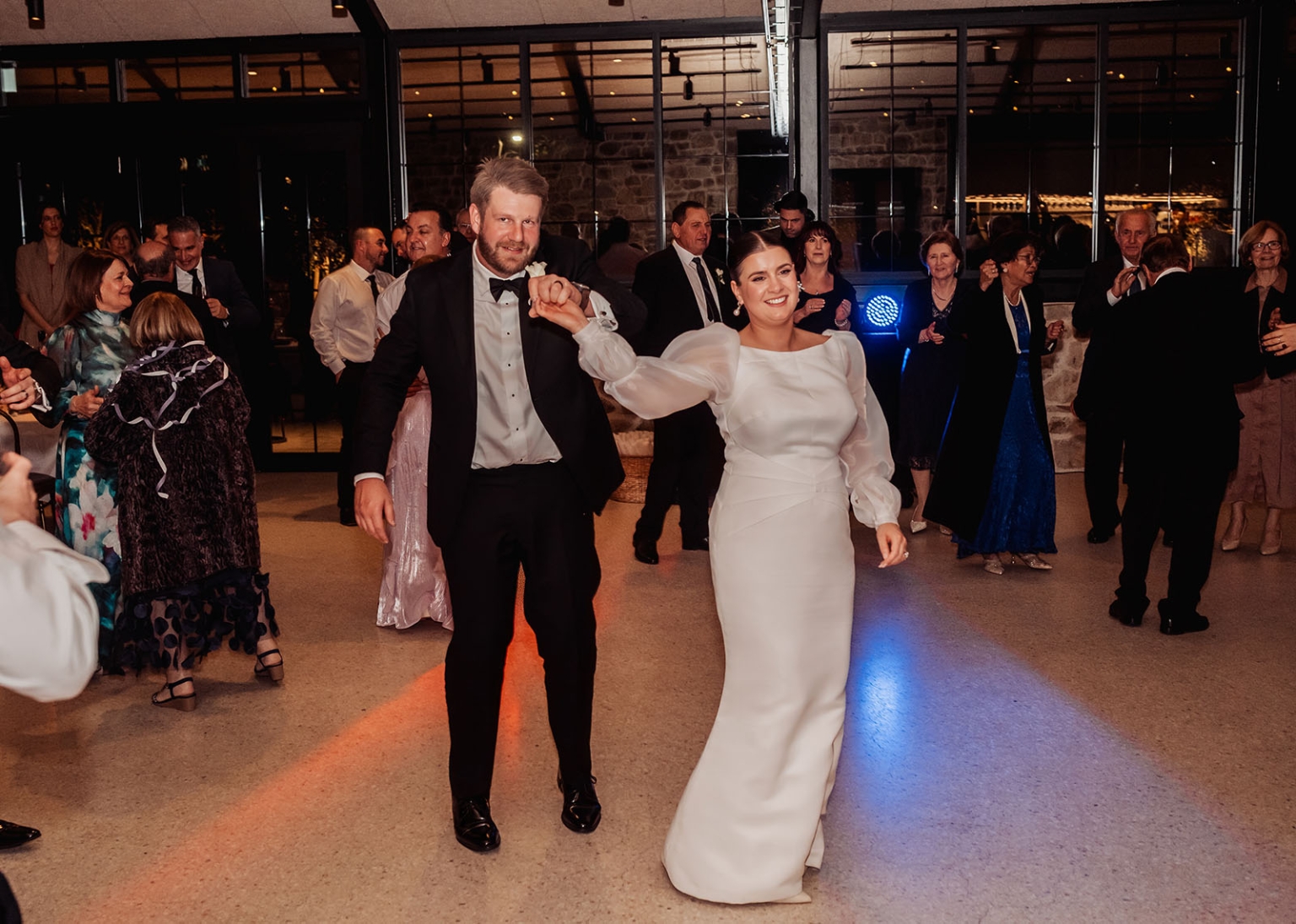 st joseph's chapel wedding – diana & michael 50 Diana and Michael dancing together at their wedding reception as guests look on