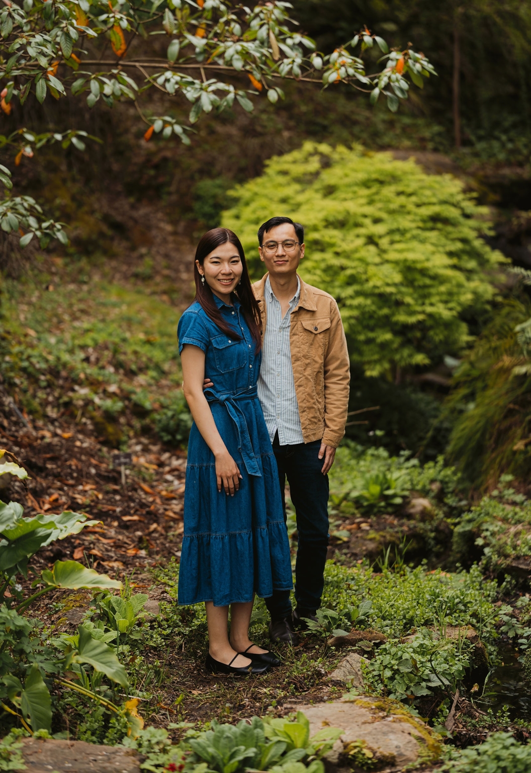 mt lofty botanic park proposal – watay & phouthun 16 Watay and Phouthun standing together among lush greenery at Mount Lofty Botanic Garden