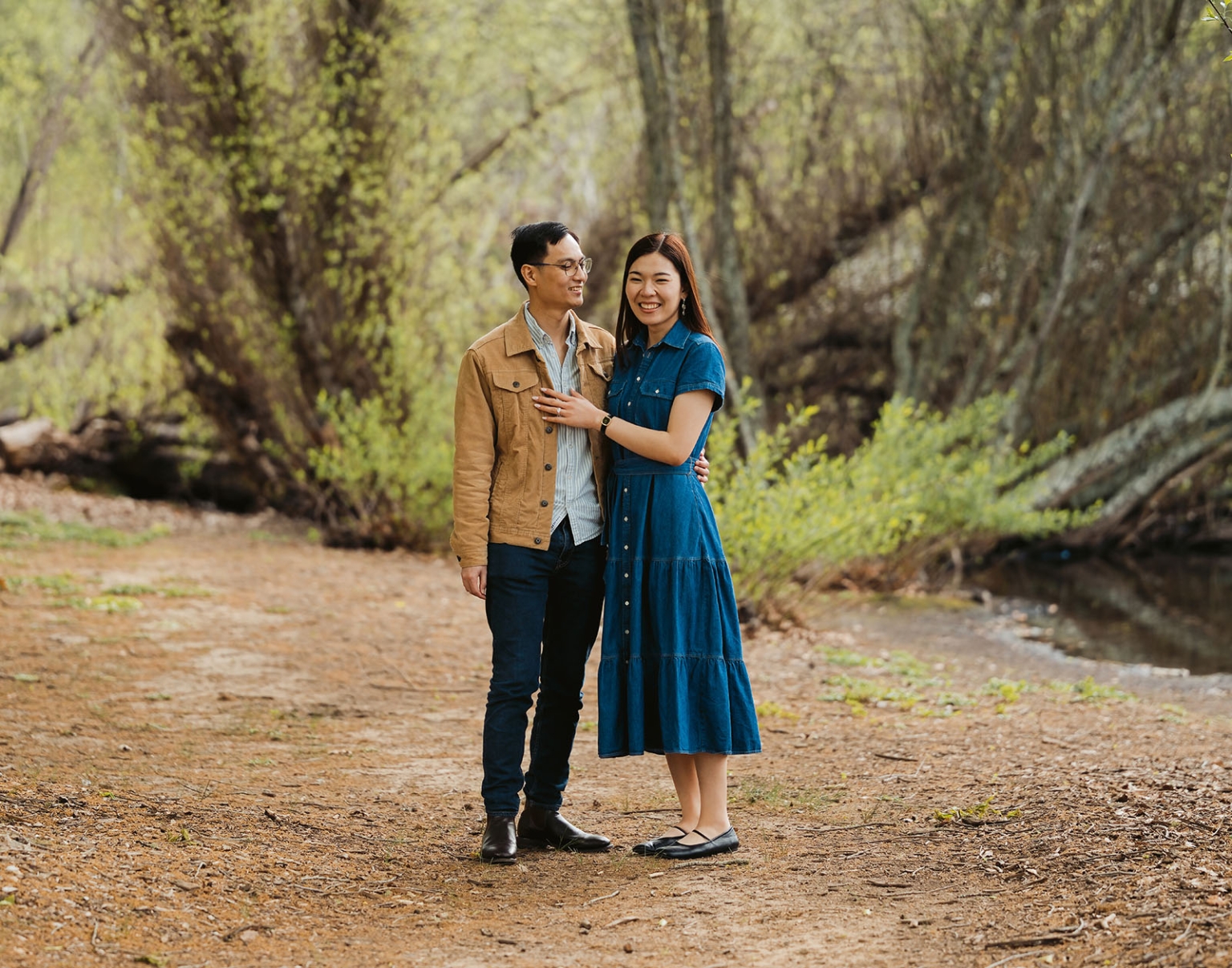 mt lofty botanic park proposal – watay & phouthun 27 Watay and Phouthun smiling together beside a creek in Mount Lofty Botanic Garden