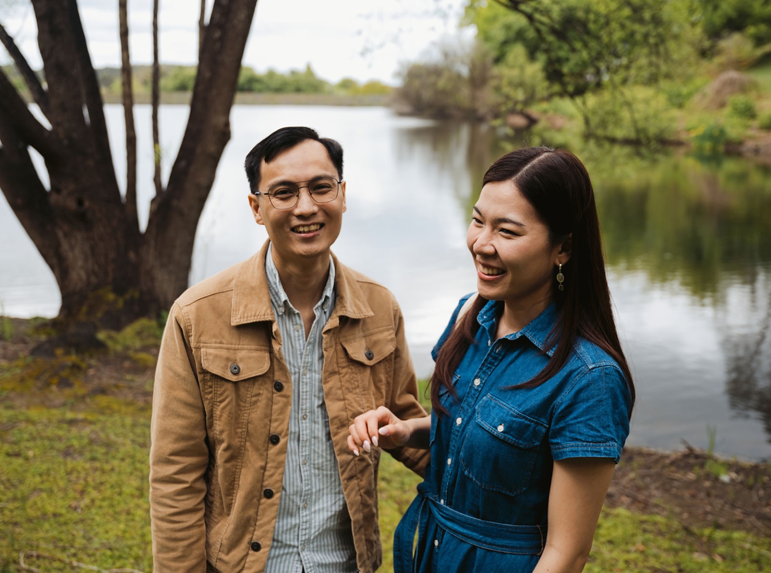 mt lofty botanic park proposal – watay & phouthun 6 Watay and Phouthun smiling beside a lake at Mount Lofty Botanic Garden