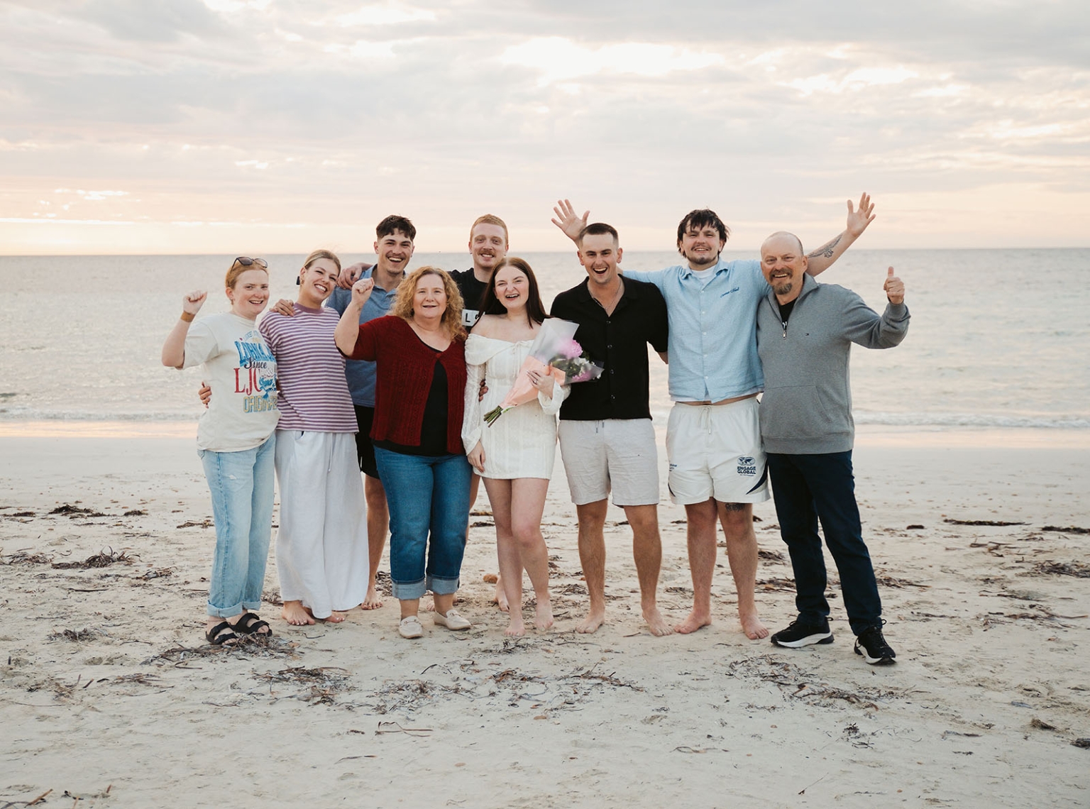 moonta's simms cove proposal – zoe & nathan 23 Zoe and Nathan celebrating their proposal with family and friends on the beach at Simms Cove, Moonta