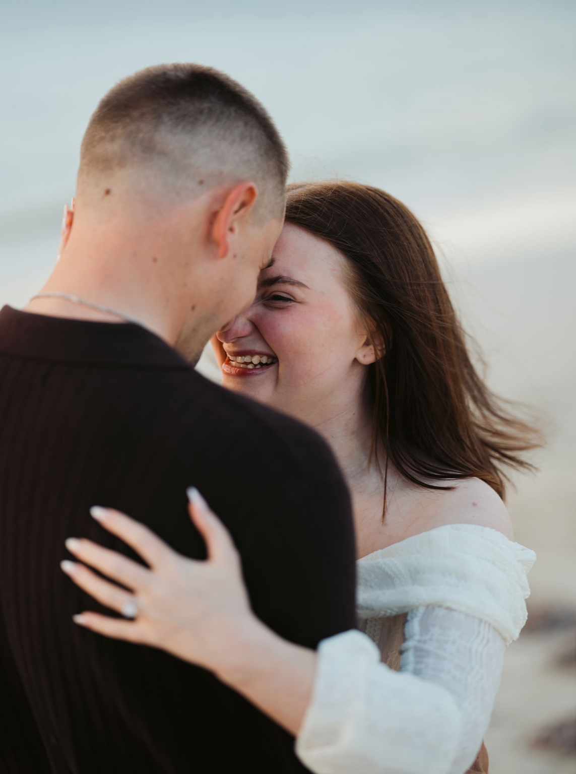 moonta's simms cove proposal – zoe & nathan 15 Zoe smiling as she embraces Nathan at Simms Cove, Moonta